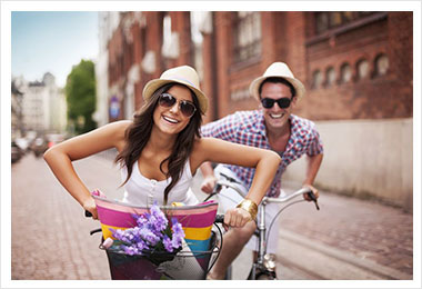 Couple riding bikes